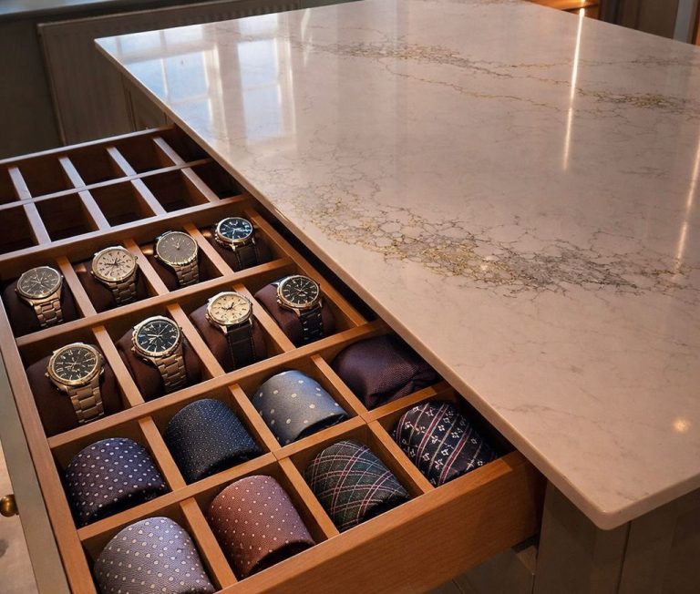 Modern interior featuring stylish cabinetry, shelves, and drawer storage.